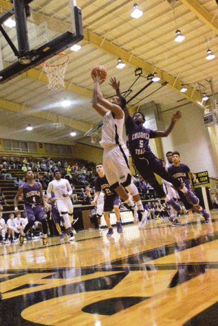 Boys Basketball Wins District Title