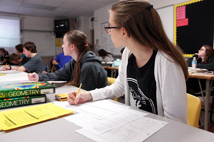 In pre-AP Geometry, freshman Brooke Inman works in Mrs. Wuthrich’s third period class. “I like how we get to use calculators,” she said. “She really tries to help us when we don’t understand stuff.”