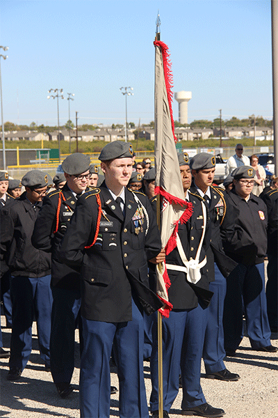 Before the Veterans Day ceremony JROTC waits.