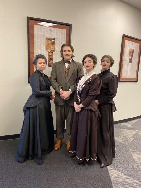 Sam Eytalis (Last person on the right) stands with other actors in their costumes for the UIL show.