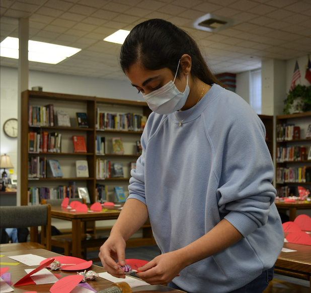 Manasvi Reddy makes candy grams during a Student Council activity in February.  