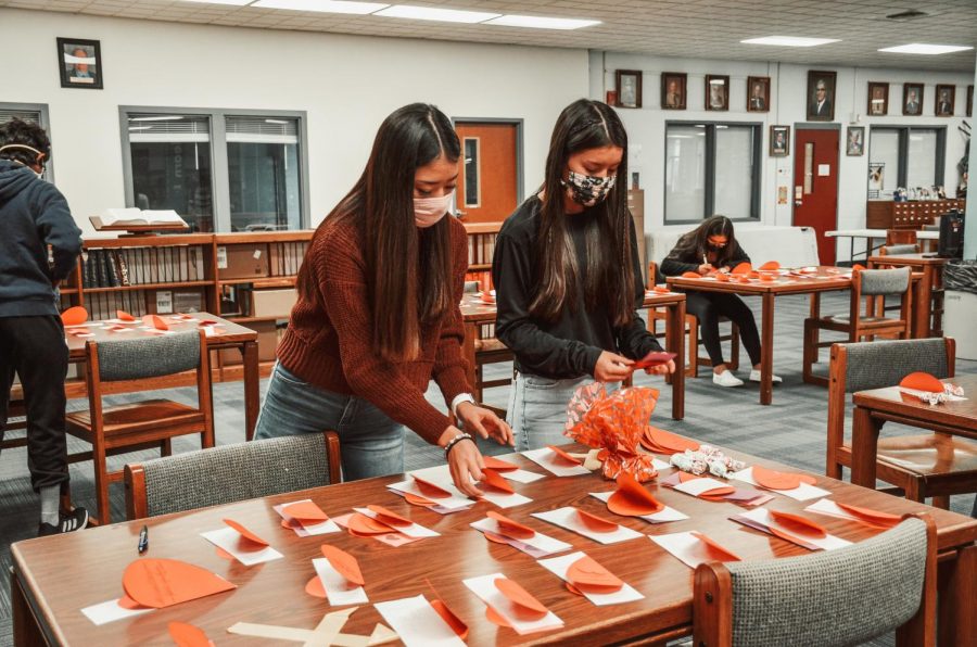 Elaine Au and Sandra Le organize candy grams for the student council last year. 