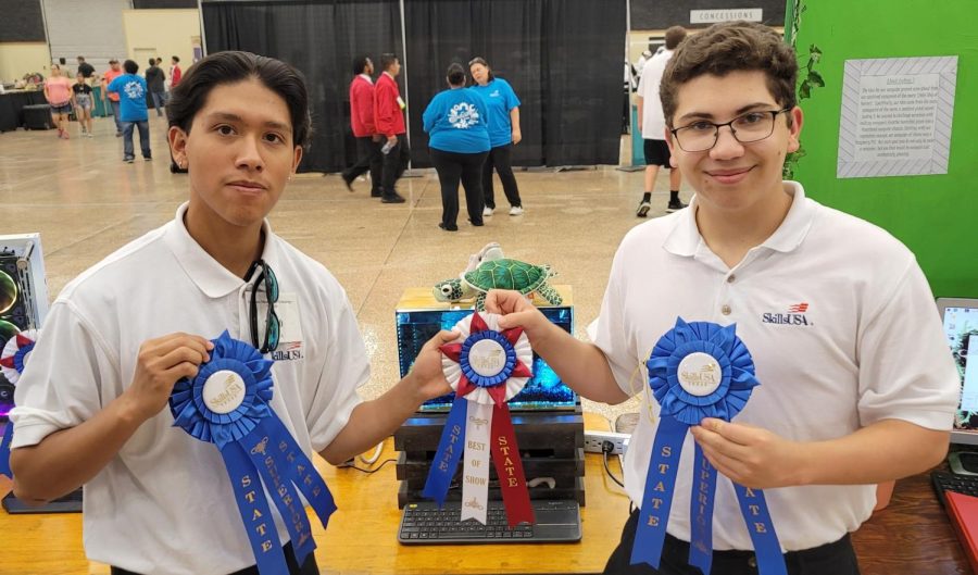 Caleb Tippit (left) and Ben Marin (right) with the computer they built