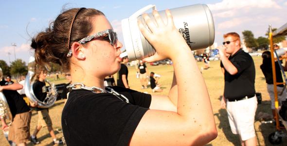 Drum Major Lydia White takes a water break during summer band.