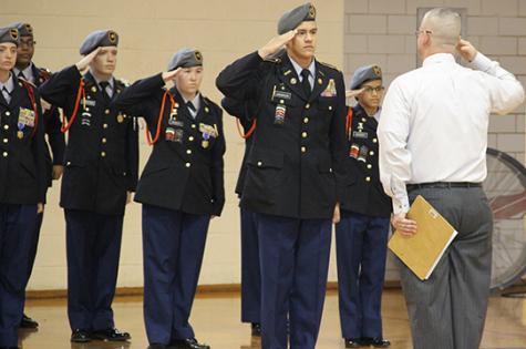 JROTC Executive Officer Austin Laughlin salutes the inspector at the JROTC inspection Dec. 9. The inspection is usually in April. In spite of the early date the group met requirements with a satisfactory score.