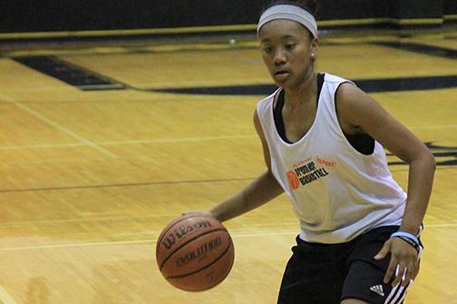 Junior Airielle Wise runs a drill on Oct. 9. The varsity girls basketball team started the season ranked tenth in the state.