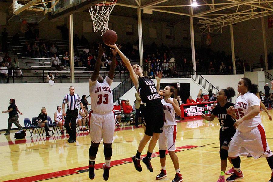 Junior Rachel Richie shoots a lay-up during a game against Old High.