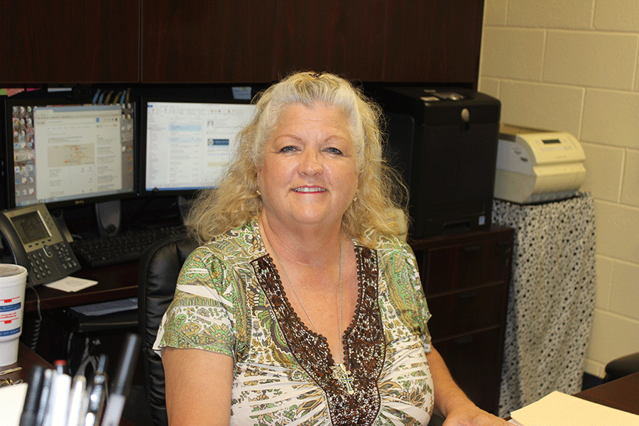 Administrative assistant and bookkeeper Montie Carroll takes care of much of the business that keeps the school running.