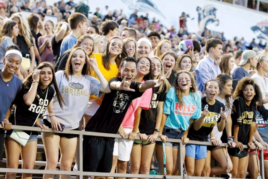 The Seniors cheer in the front row of thestudent section for the first game of the season. (From left to right Airielle Wise, Kelsey Pocowatchit, Morgan Taff, Tommy Che, Karla Gonzalez, Nicole Linn, Paige Hollingsworth, Teresa Vu, Brittany Williams and Leah Slade).