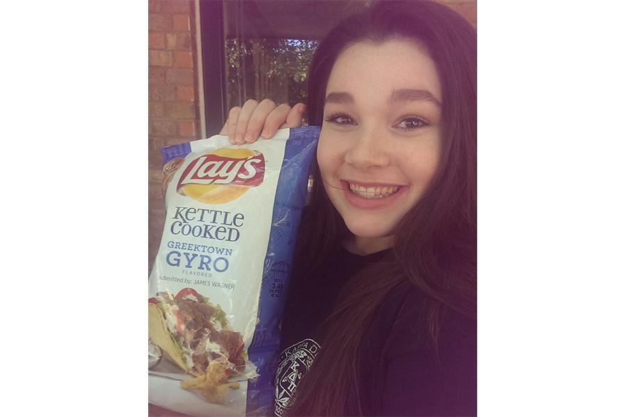 Kallie supported her dad by telling her friends and others to vote for the Kettle Cooked Greektown Gyro chips. 