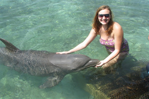 While in Cartagena I visited an ourdoor aquarium and swam with a dolphin. At night my family went to the historic part of the city, riding around in a horse drawn carriage.