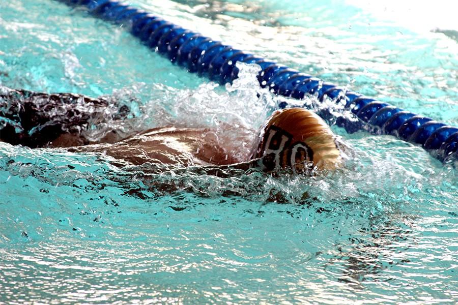 Sophomore Brandon Malone turns during the 200-yard Individual Medley against Decatur High School.