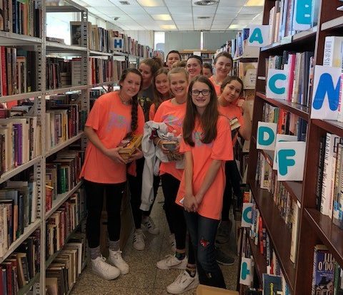 Student Council members volunteering with Friends of the Public Library on Teens Make a Difference Day.