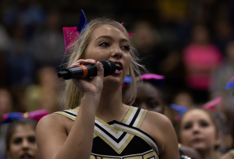Rider cheerleader Helicity Johnson speaks at the school's first press conference earlier this month. 