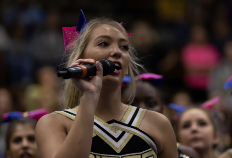 Rider cheerleader Helicity Johnson speaks at the schools first press conference earlier this month. 