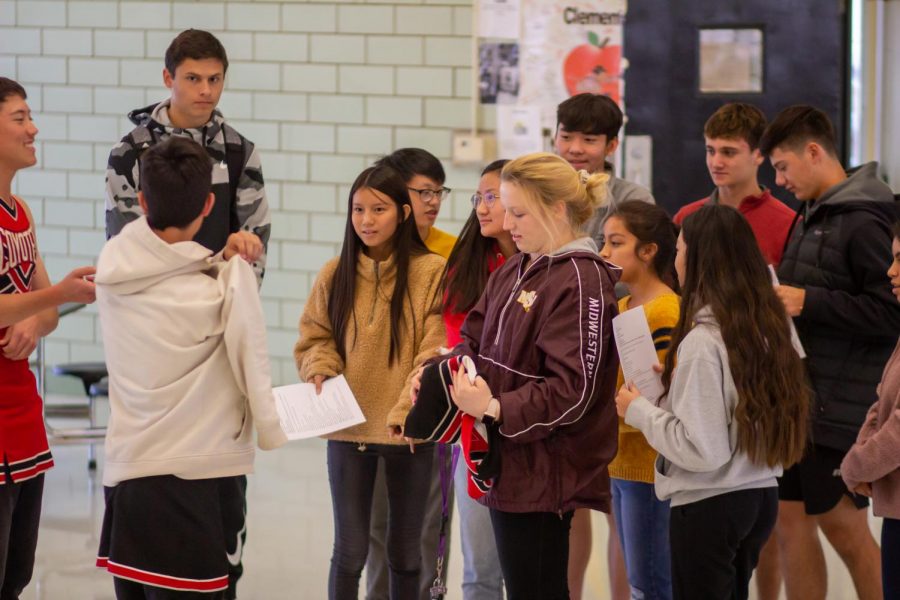 Sophomores rehearse their The Dating Game skit after school