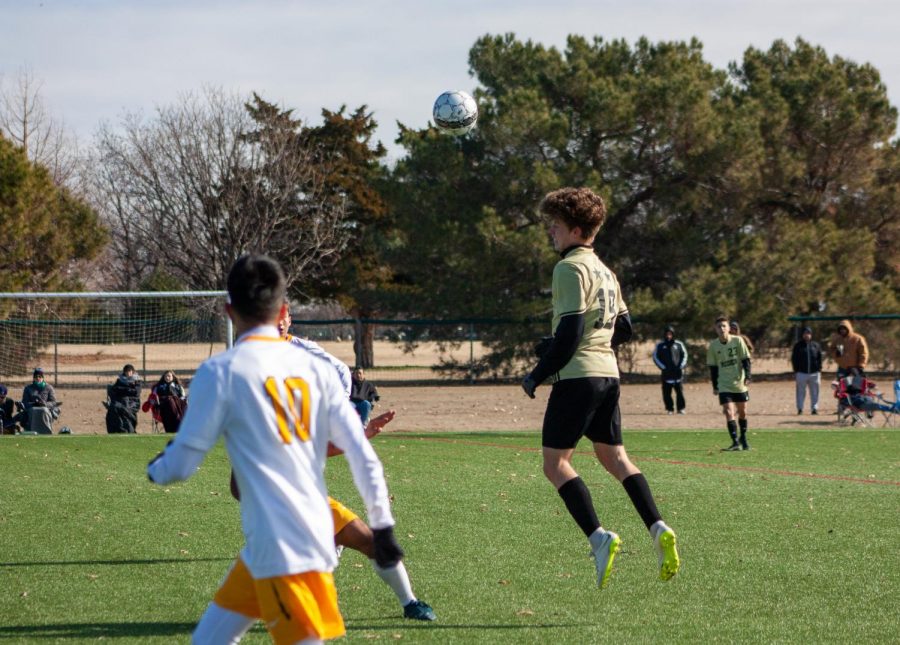 Riley Marshall head-butted the ball away from the opposing team in a game. 