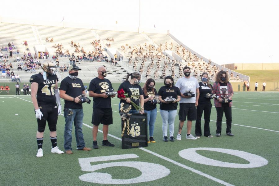 Kaleb’s family received a framed No. 42 jersey on Sept. 25, “Kaleb Honea Night,” as the crowd honored his memory. 