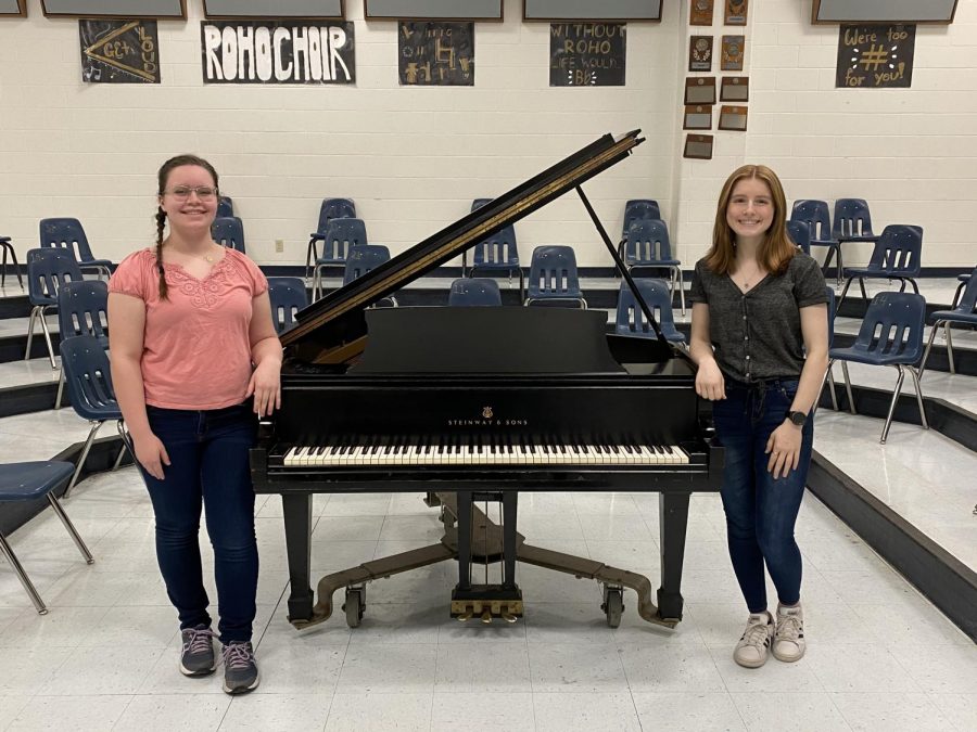 Amberly Schell, left, and Maranda Rose-Adame, right, pose infront of a piano after achieving All-State titles