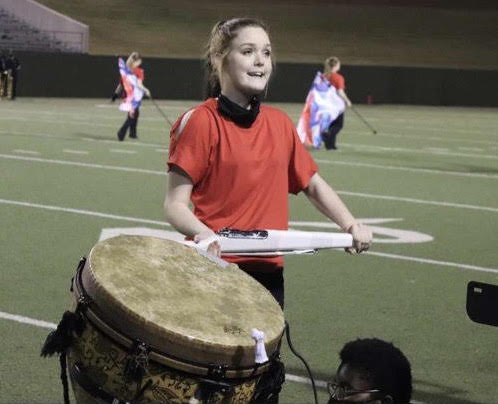 Macy Love is a senior section leader in the color guard this year. 