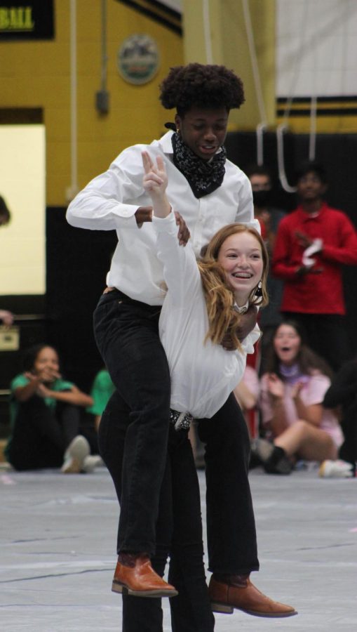Kendrick Marks and Ramona Rainbolt dance at the Round Up assembly. 