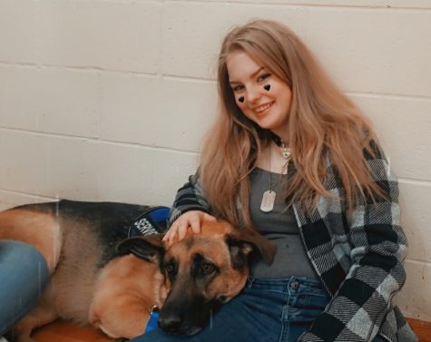 Junior Ashley  Gertonson pictured along with her service dog, Tinkerbell.