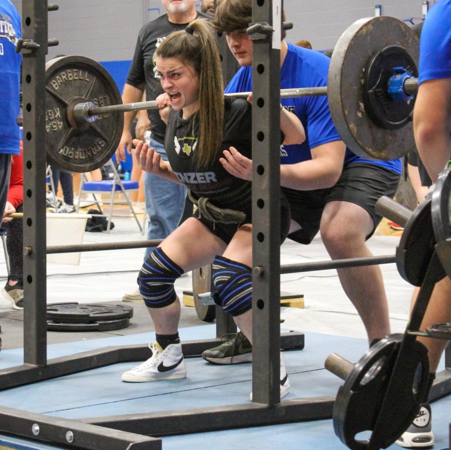 Ashley Anderson squats during the City View meet.