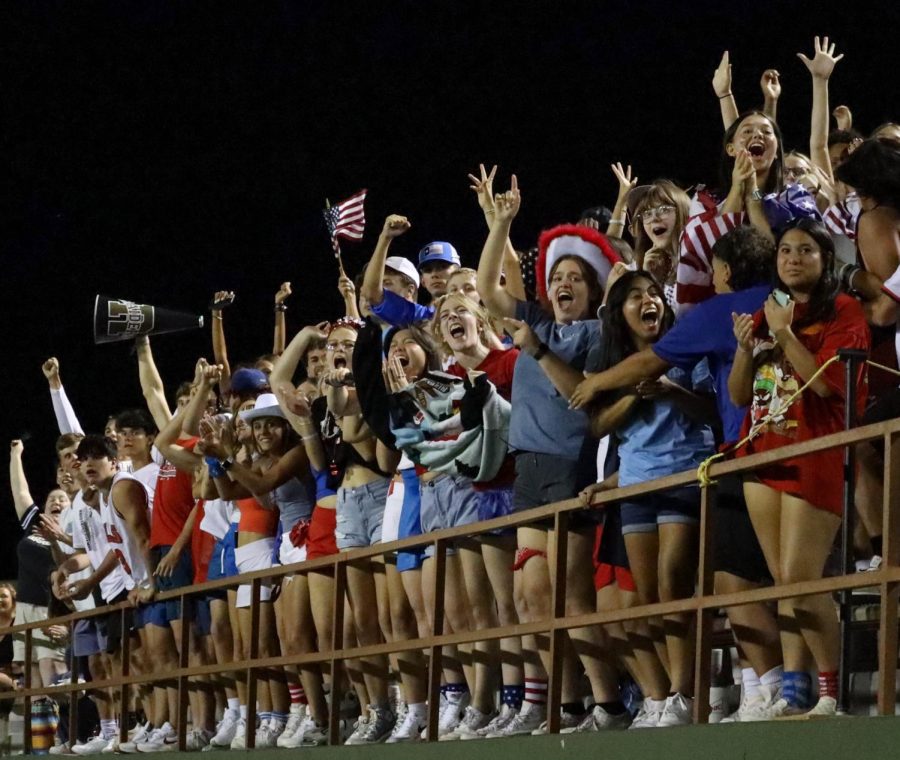 Students celebrate at a football game