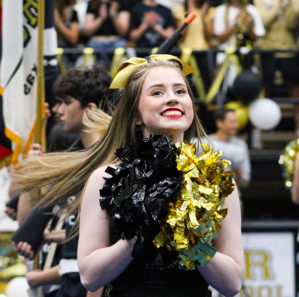 Ava Bronaugh cheers at the Rider-Old High pep rally in August. 