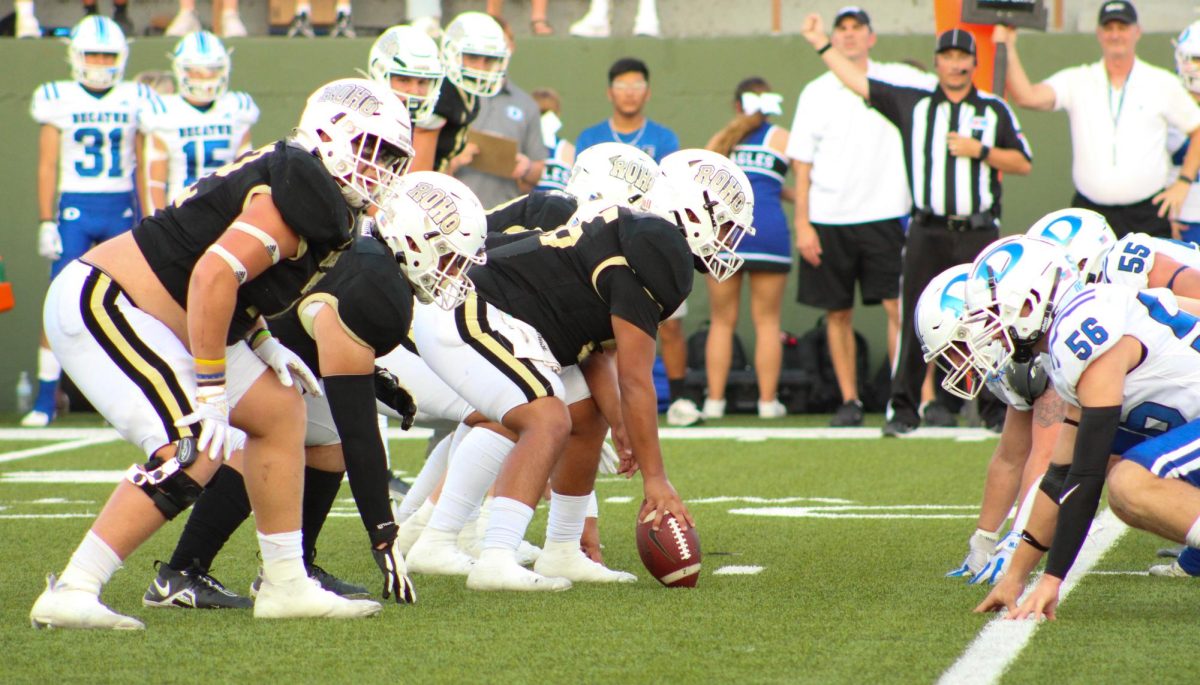 Cape Johnson (left) and the rest of the Raiders offensive line has played a key role in the programss first district title since 2008. 