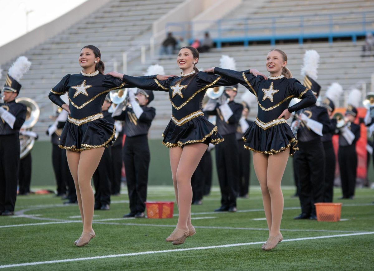 Juniors Hannah Roseli, Riley Harvey and Maegan Roberson will all be making the transition from Raiderettes to the drill teams at Legacy and Memorial next year. 